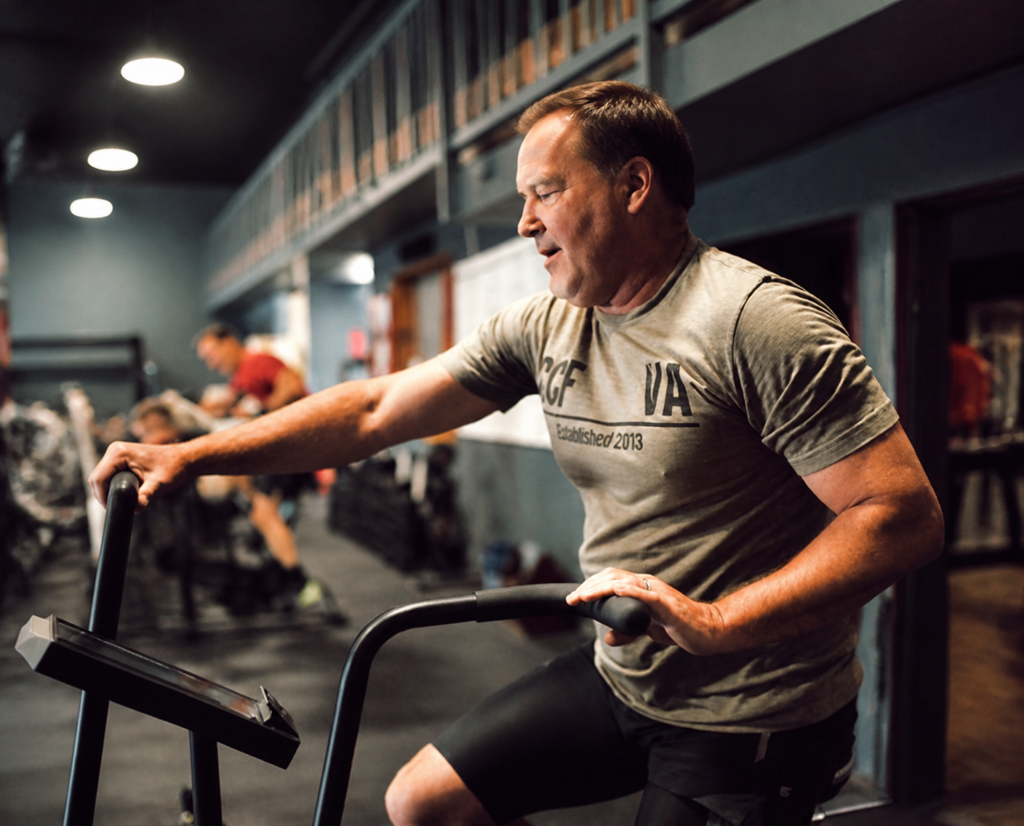 Member training on an air bike at Catoctin Fitness